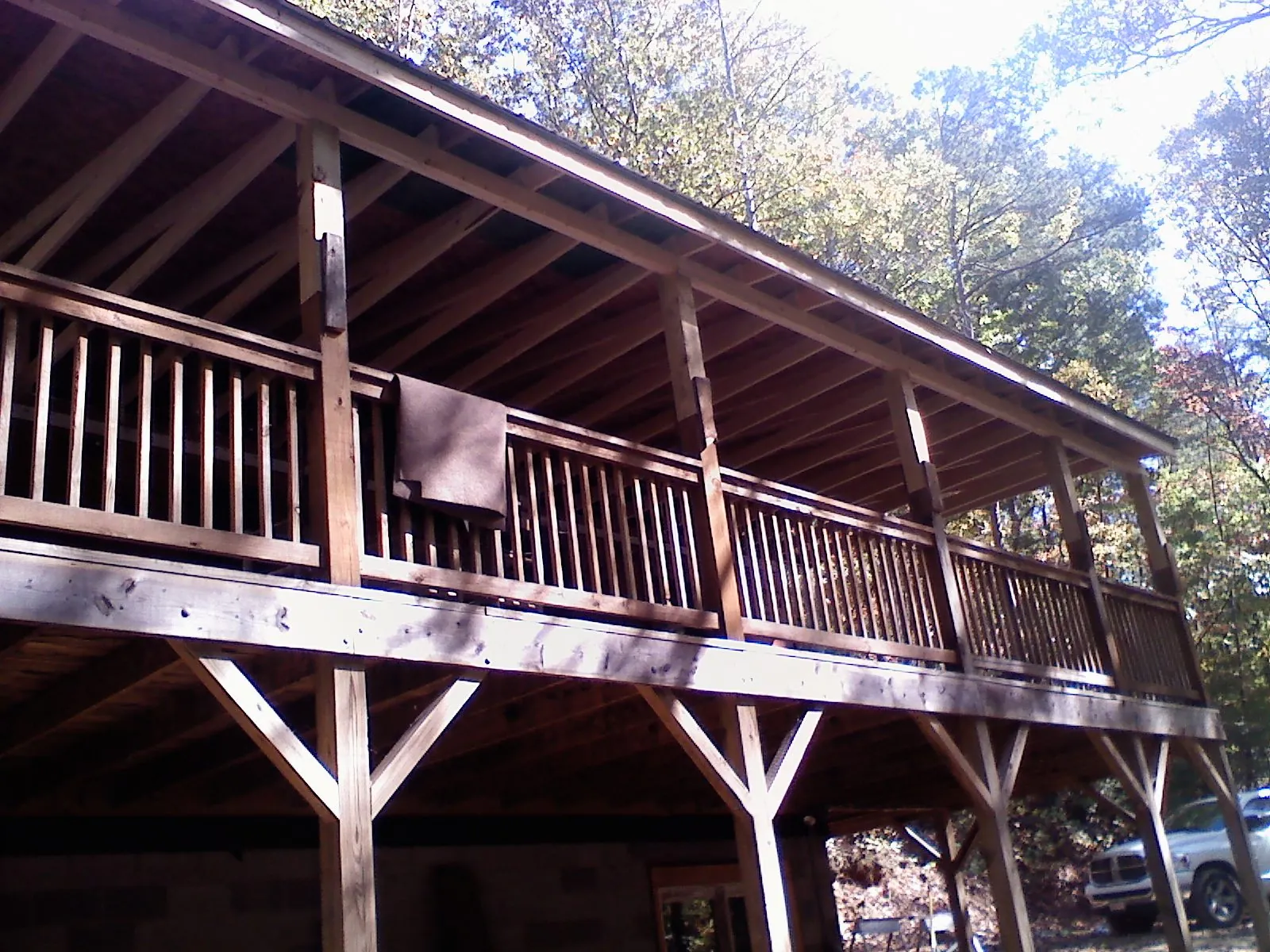 Timber framing under a new elevated porch and deck — Roof Leak Repair in Equinunk by Roofing Brothers